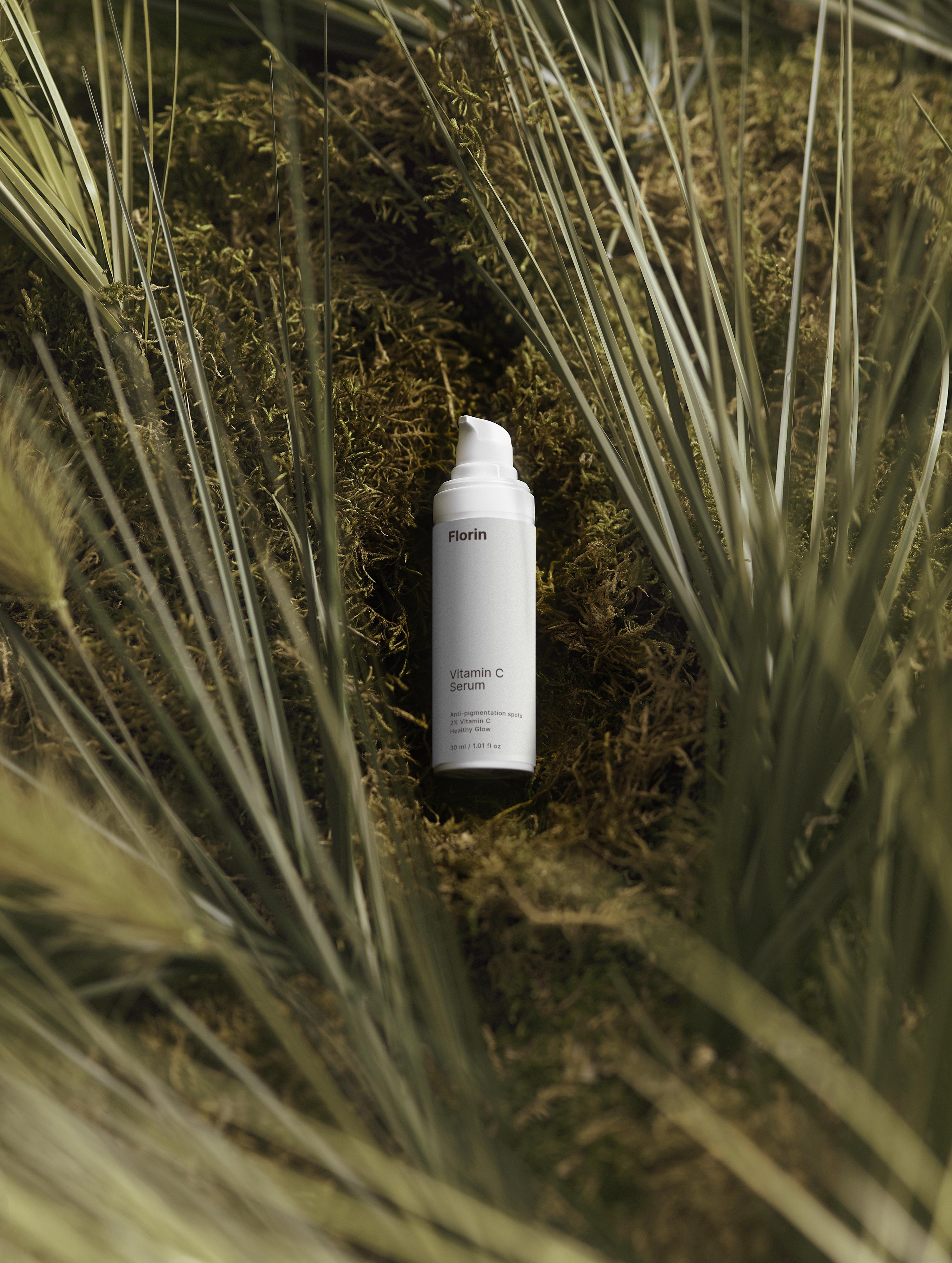 Skincare bottle with 'Farm' branding on a natural background