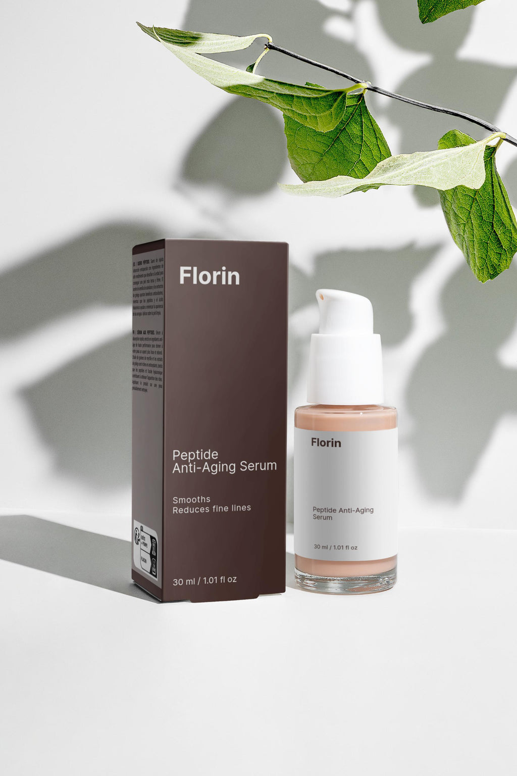 Florin Peptide Anti-Aging Serum bottle and packaging on a light background with leaves.