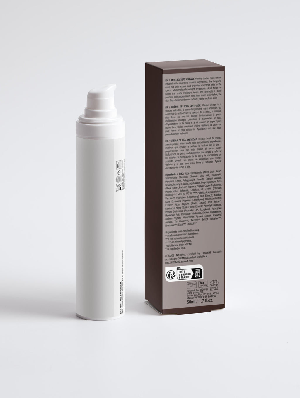 White spray bottle and its packaging on a light gray background