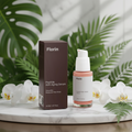 Florin Peptide Anti-Aging Serum bottle and box on a marble surface with white orchids and green leaves.