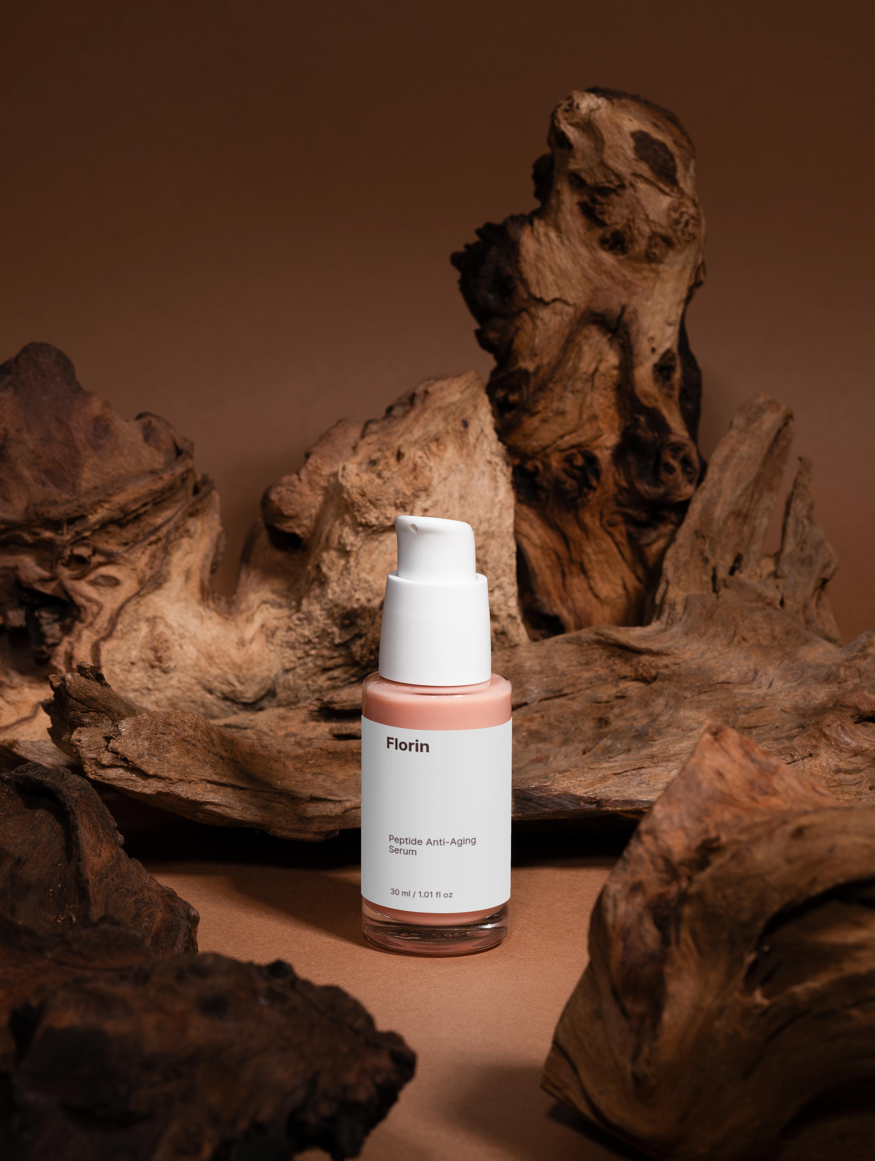 Skincare bottle labeled 'Florin' on a brown background with natural wood elements.